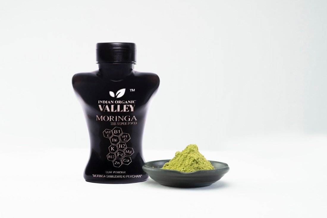 Indian Organic Valley Moringa bottle with fresh leaf powder